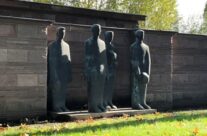 Statues watching over the Comrades Grave at Langemark German Military Cemetery – Somme and Ypres WW1 Battlefield Tour