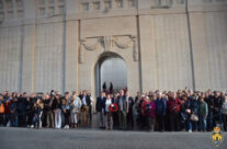 Members of the group taking part in the Last Post Ceremony at the Menin Gate in Ypres – Gardens of Stone book by Stephen Grady WW2 Tour
