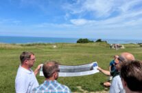 Then and now at Arromanches Mulberry Harbour – 2023 Normandy and D-Day Landings Tour